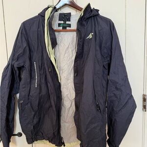 Eastern Mountain Sports women’s Black “packable” Raincoat.
